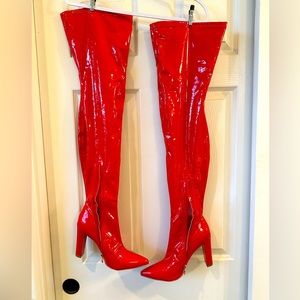 Red patent thigh high heeled boots. Size 42/11